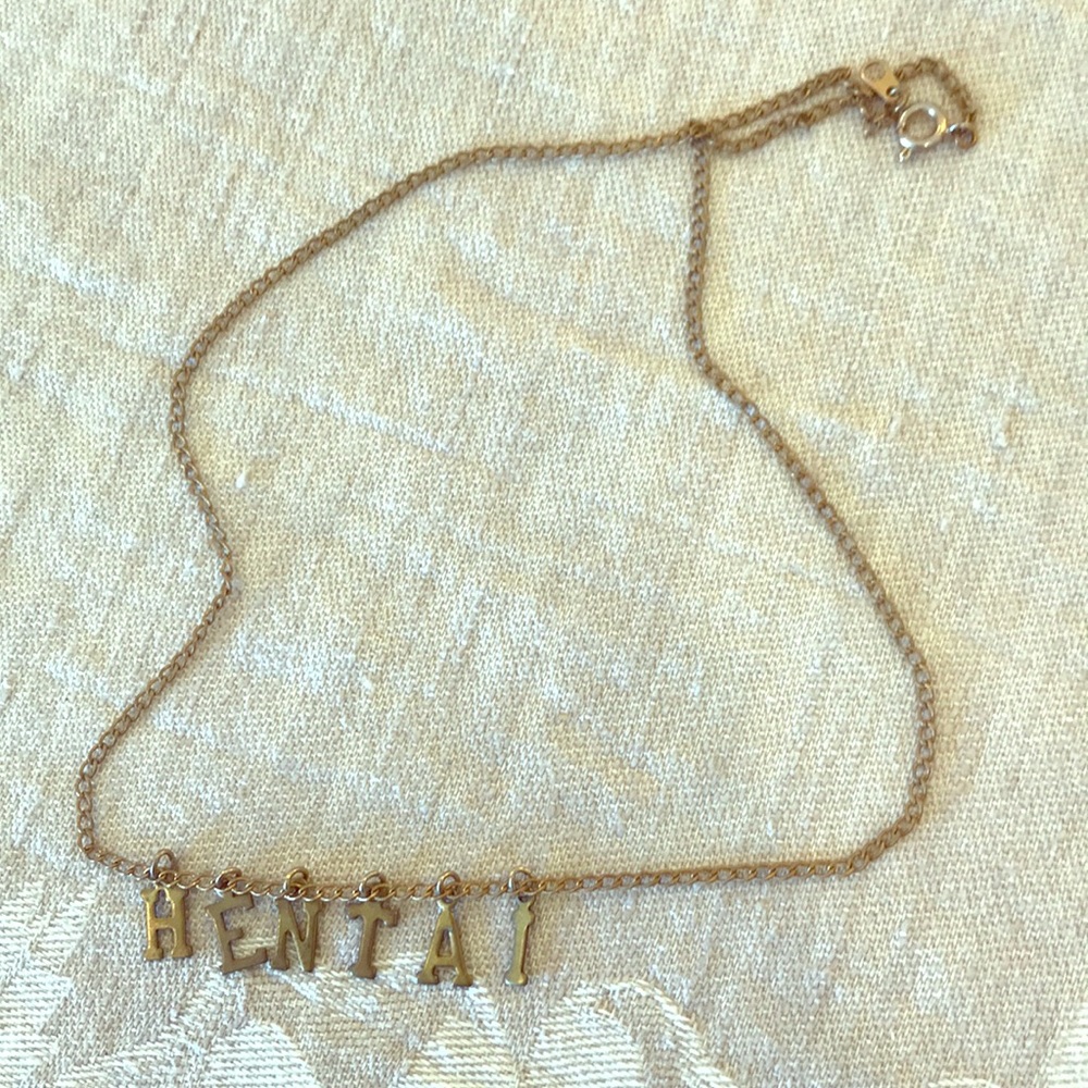 “HENTAI” letter necklace 🙀 by @Jimmytoast